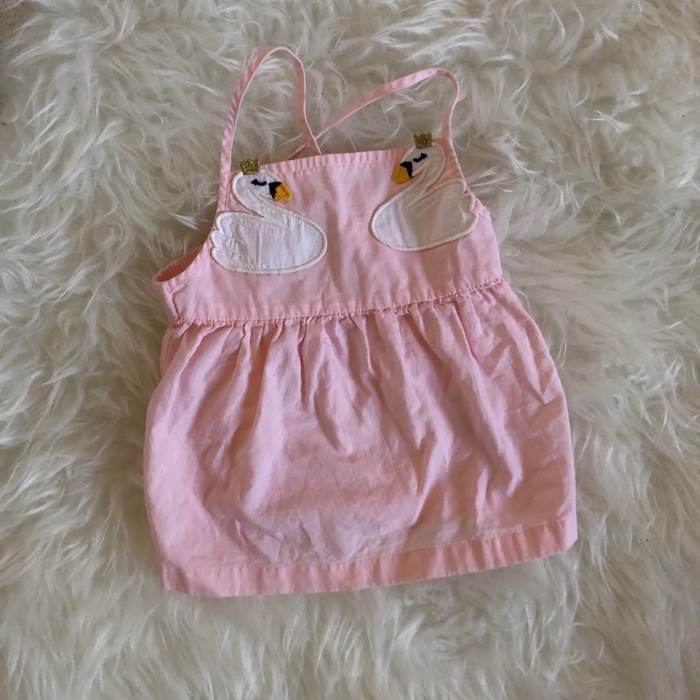 Pink tank top dress with swans